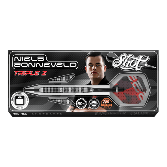 Tiro de dardos de acero Niels Zonneveld V2 Auf dem Bild ist die Verpackung der "Shot Niels Zonneveld V2 Steeldarts" zu sehen. Die Verpackung zeigt einen Dartpfeil, das Logo und ein Porträt von Niels Zonneveld.