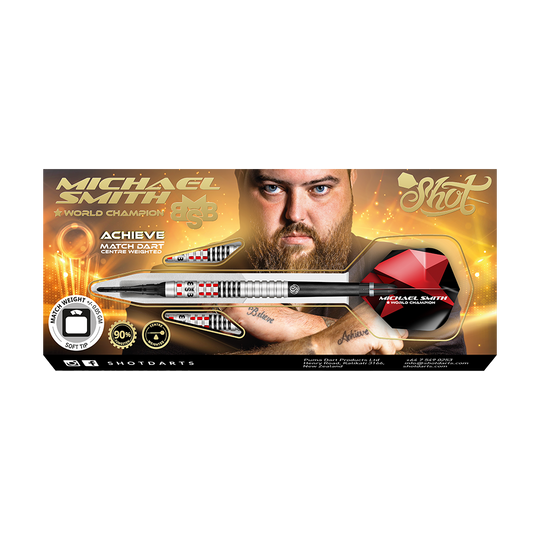 Shot de Michael Smith Achieve Soft Darts Auf dem Bild ist eine Packung mit Softdarts der Marke Shot zu sehen, die vom Weltmeister Michael Smith beworben wird. Die Verpackung zeigt ein Bild von Michael Smith und hebt die Eigenschaften des Produkts hervor.