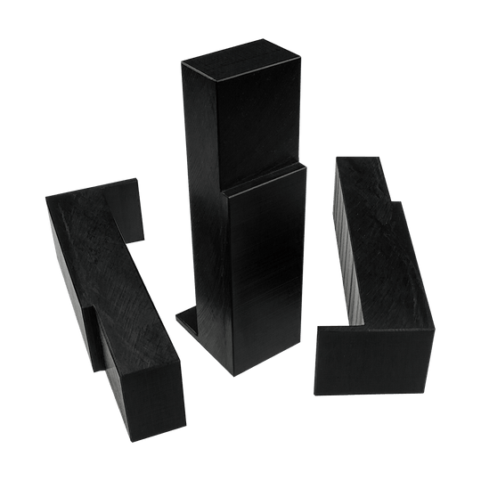 MC_Scolia_Abstandshalter_zur_Wandmontage_1 Das Bild zeigt drei schwarze Abstandshalter aus Kunststoff zur Wandmontage. Sie sind speziell für die Scolia Home 1 entwickelt worden.