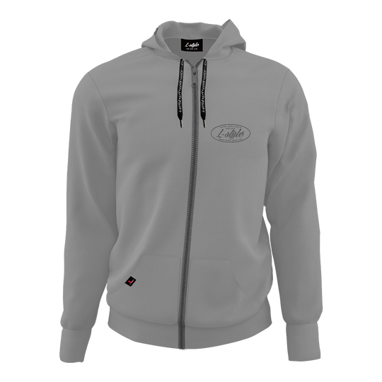 Mikina ve stylu L – šedá Der Hoodie „L-Style Hoodie - Grau“ ist grau, hat eine Kapuze und einen durchgehenden Reißverschluss. Auf der linken Brust befindet sich ein dezentes L-Style Logo.