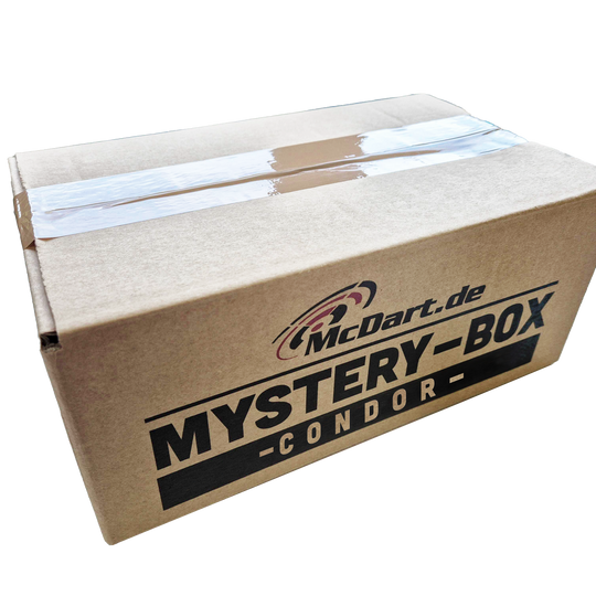 Scatola misteriosa McDart Condor Auf dem Bild ist ein brauner Karton mit der Aufschrift "McDart.de Mystery-Box Condor" zu sehen. Der Karton ist mit Klebeband versiegelt.