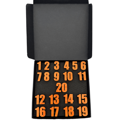 Anneaux numérotés pour cible de fléchettes McDart / Anneaux numérotés classiques Das Bild zeigt eine Box mit der Aufschrift Classic Orange. Die Verpackung ist im gleichen Stil gehalten.