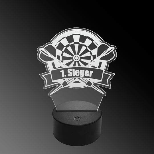 Lampa rzutkowa LED z pleksiglasu z niestandardowym tekstem Das Bild zeigt eine LED-Lampe mit einem Plexiglasaufsatz in Form eines Dartboards und zwei gekreuzten Darts. Auf dem Schild steht "1. Sieger" geschrieben.